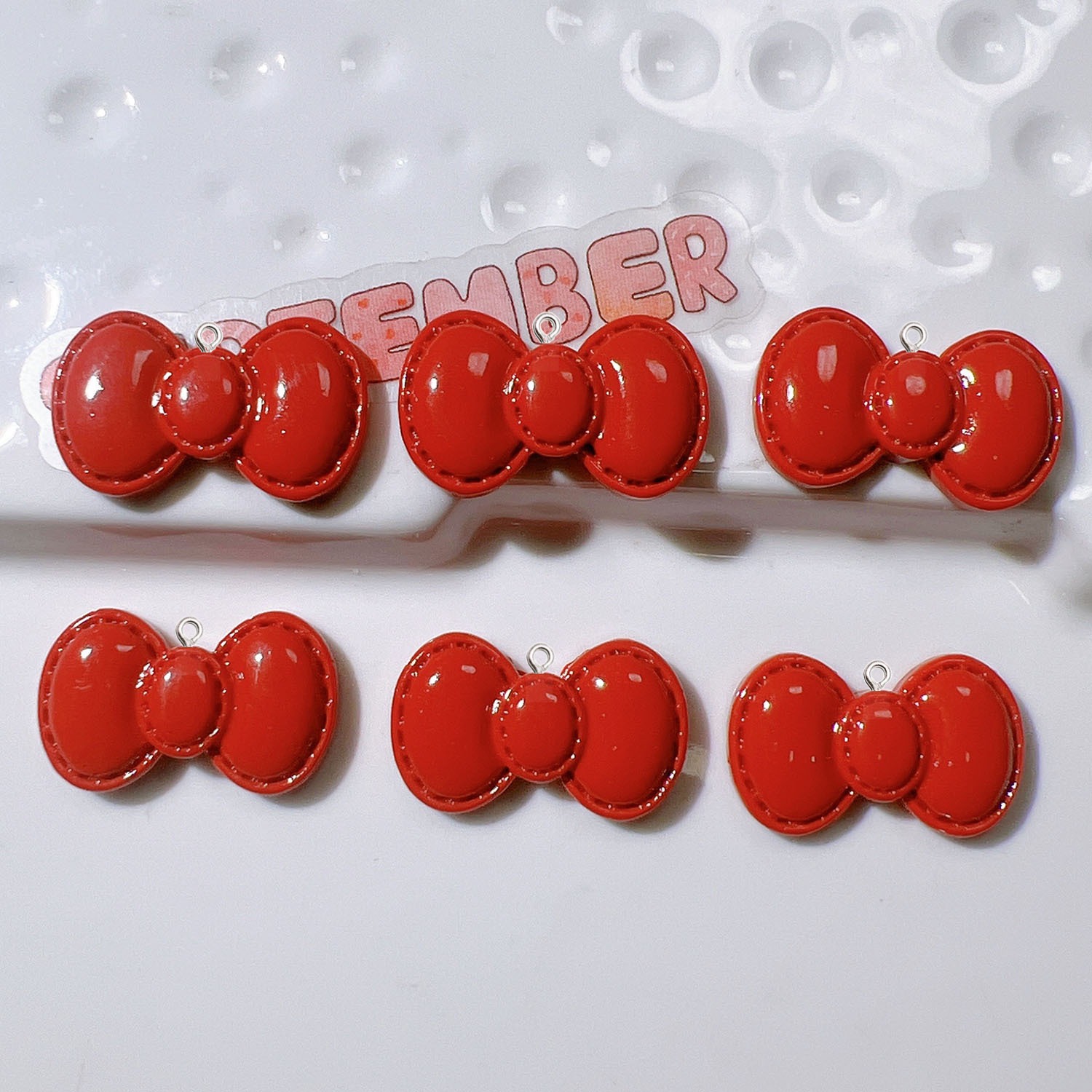 10 Stück niedliche Cartoon-Bow – Resin Art Earrings Material Bewertung und Preis